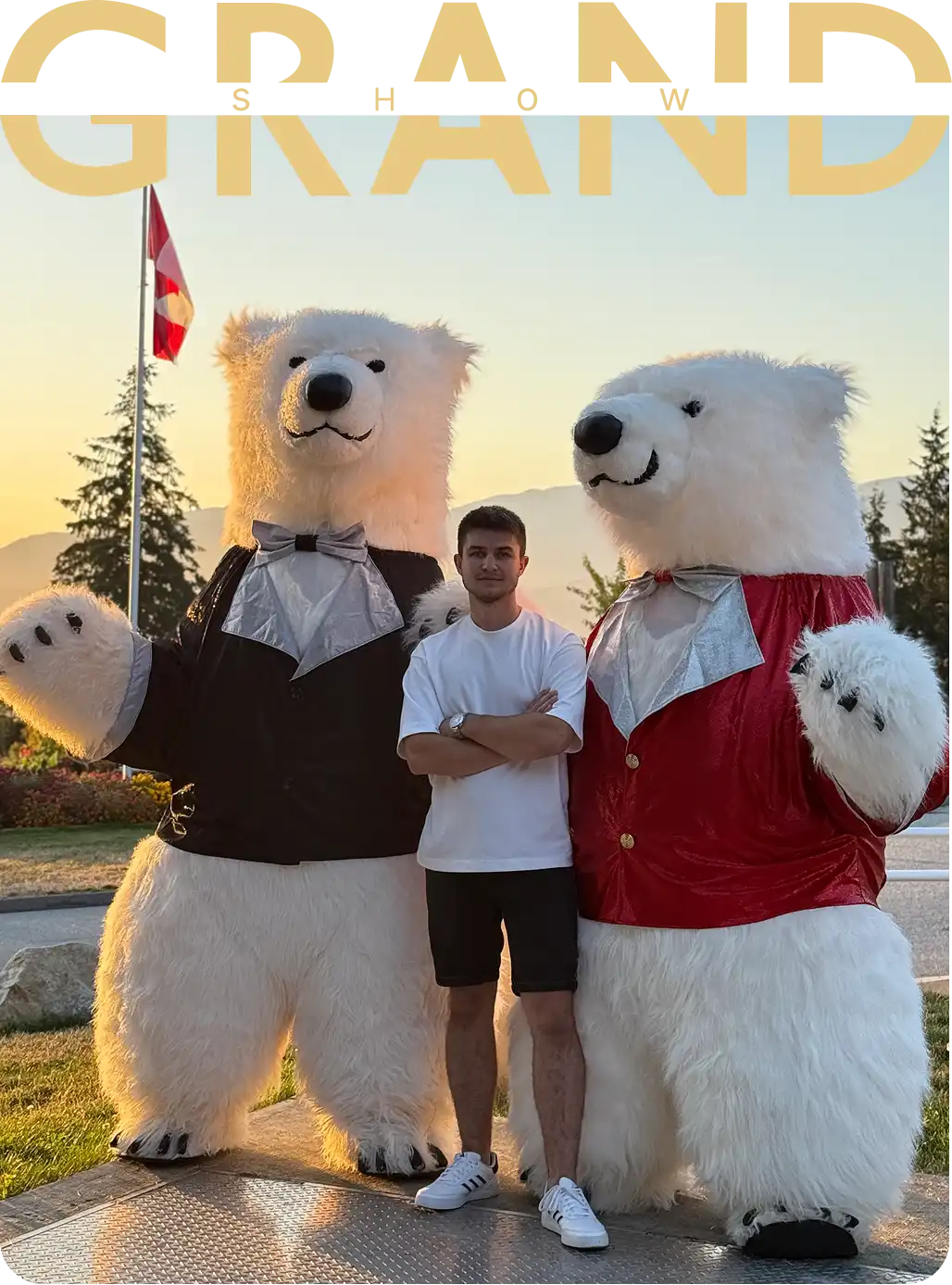 Two life-size polar bear mascots with a performer at an outdoor event in Vancouver, Grand Show Entertainment