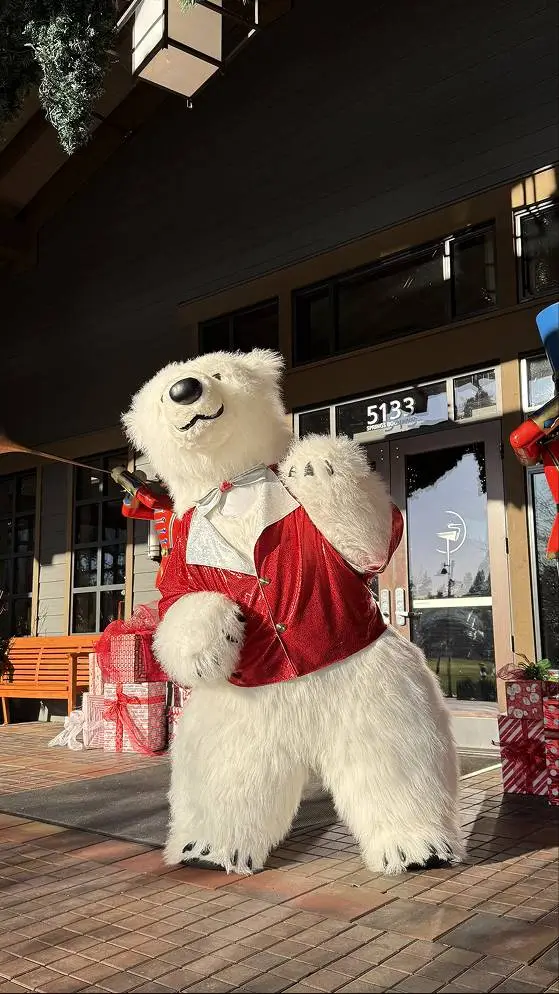 Polar bear mascot performing a custom holiday show in Vancouver, live entertainment by Grand Show