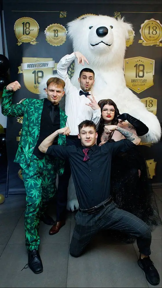 Polar bear mascot in red outfit performing outdoor event entertainment in Vancouver