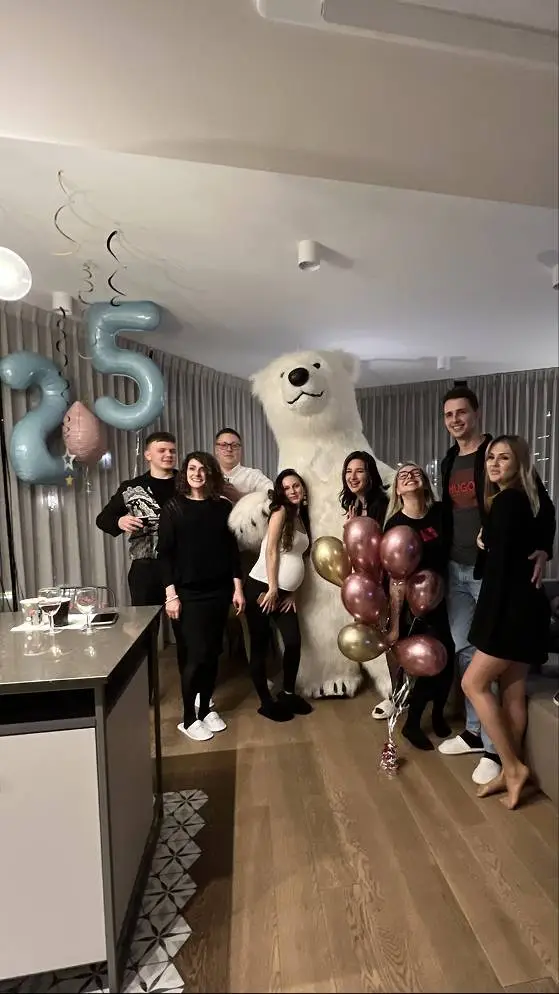 Group celebration with a polar bear mascot at a private birthday party in Vancouver