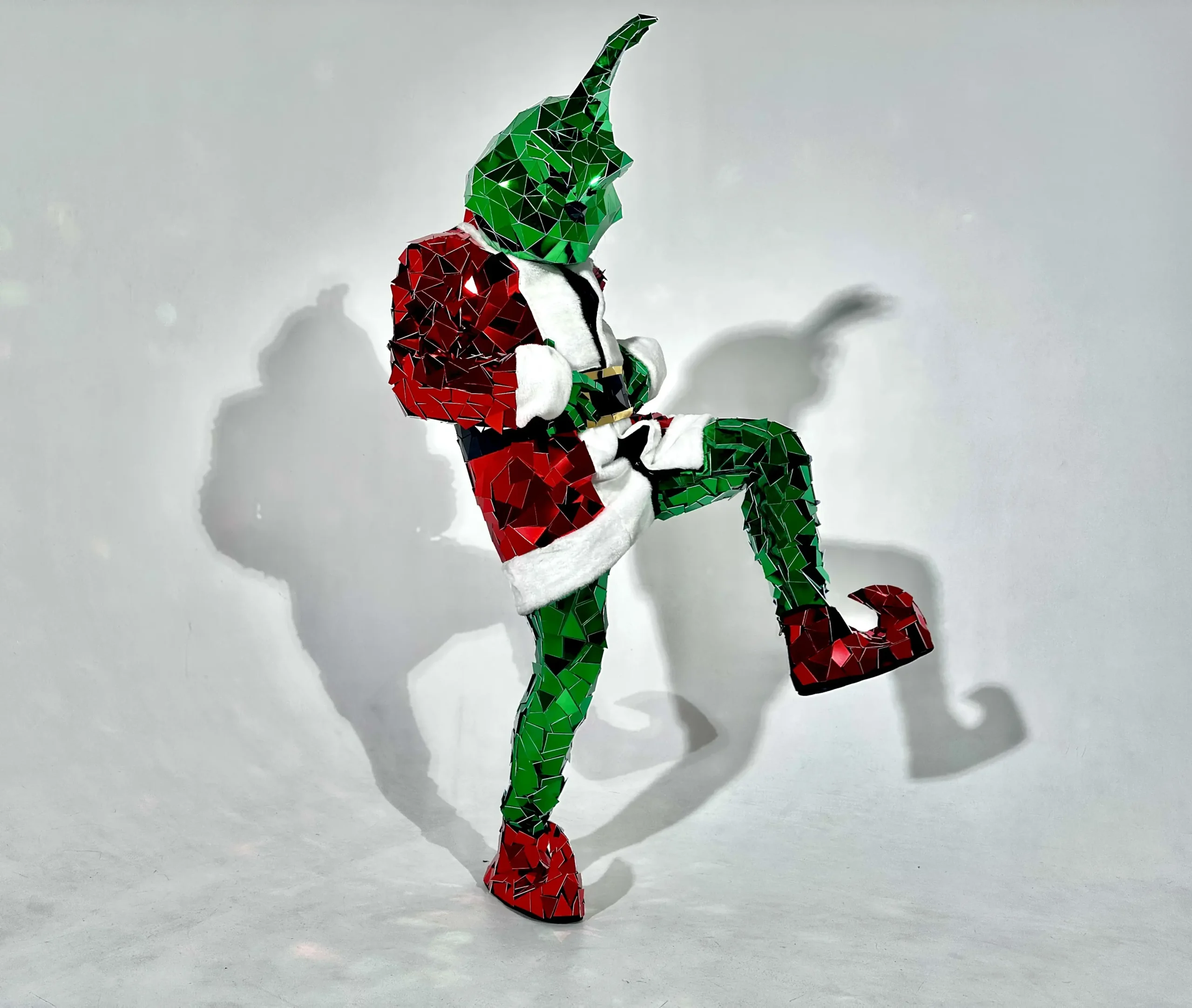 Green Christmas Character in a mirrored costume